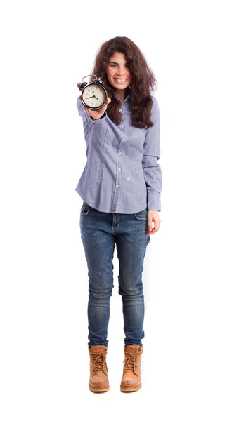 Funny girl holding an alarm clock — Stock Photo, Image
