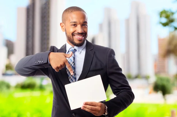 Joven fresco negro hombre con un palcard —  Fotos de Stock