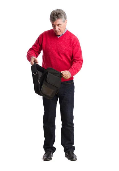 Surprised man opening a baggage — Stock Photo, Image