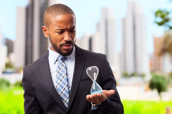 Joven fresco negro hombre con un temporizador — Foto de Stock