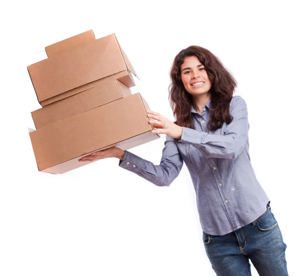 Satisfied girl with a cardboard boxes — Stock Photo, Image