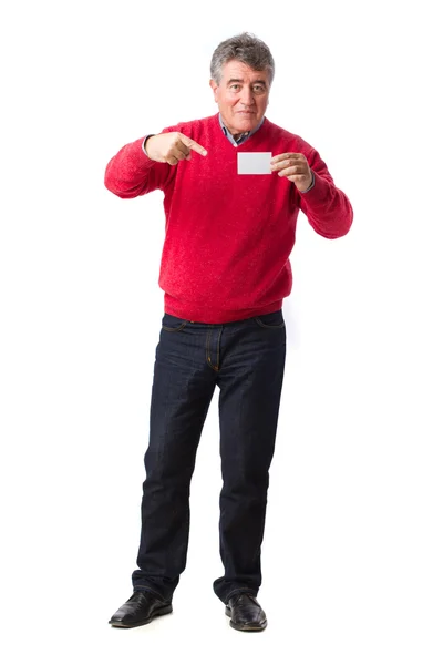 Homem feliz segurando um cartão de nome — Fotografia de Stock