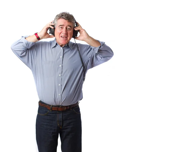 Gelukkig mens met een hoofdtelefoon — Stockfoto