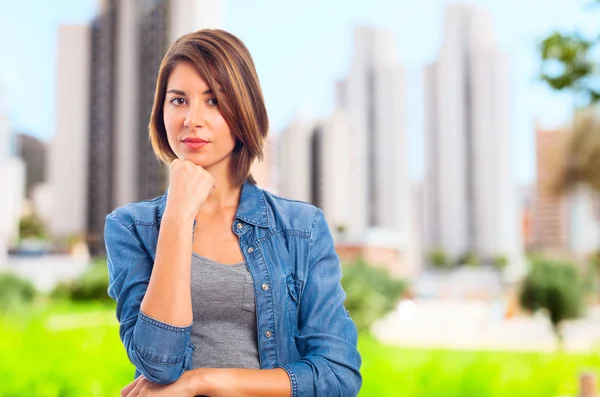 Young cool woman thinking — Stock Photo, Image