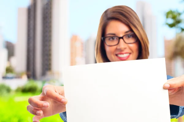 Young cool woman with a placard — Stock Photo, Image