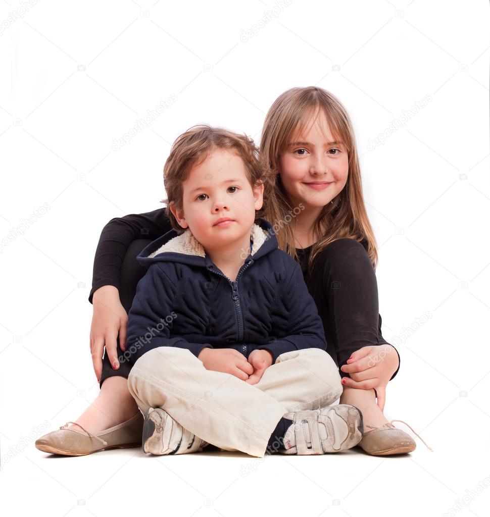 Young boy and girl posing