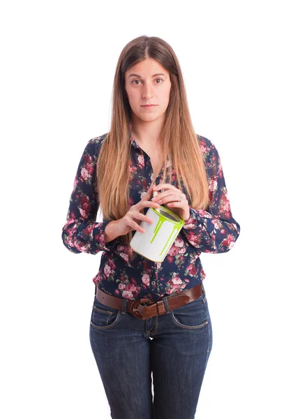 Menina pensativa com uma lata de tinta — Fotografia de Stock