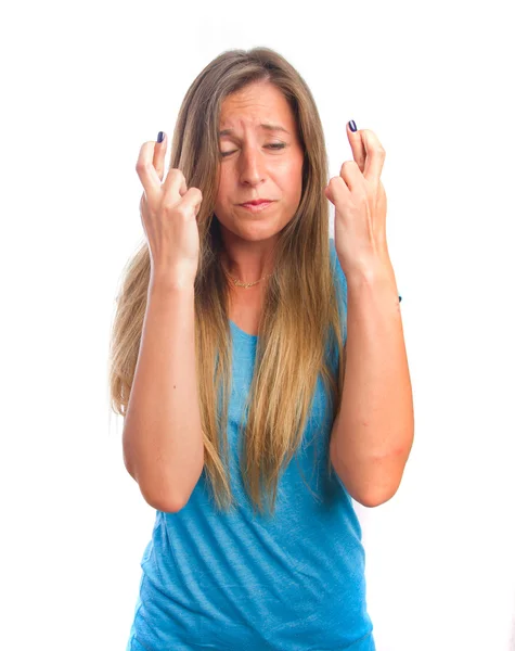 Pensive girl finger crossed gesture — Stock Photo, Image