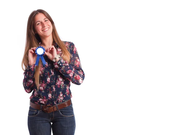 Menina vencedora segurando uma medalha — Fotografia de Stock