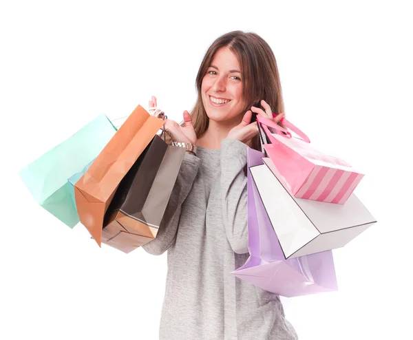 Chica satisfecha con una bolsa de compras —  Fotos de Stock