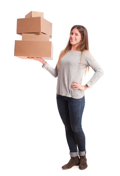 Happy girl holding a cardboard boxes — Stock Photo, Image