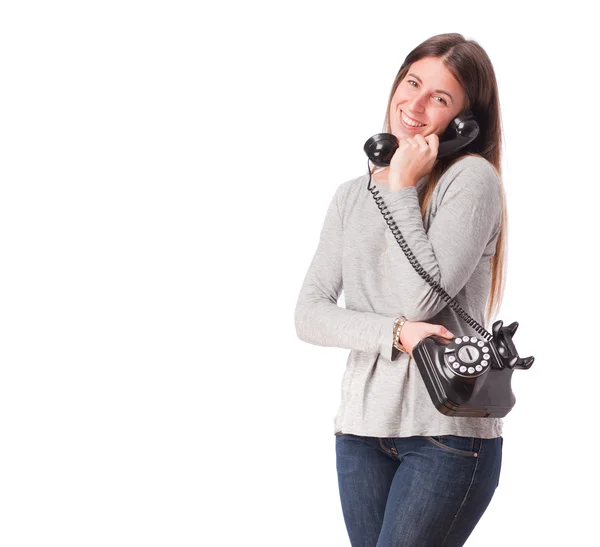 Satisfied girl with a telephone — Stock Photo, Image