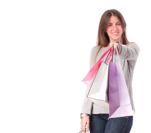 Menina feliz segurando um sacos de compras — Fotografia de Stock