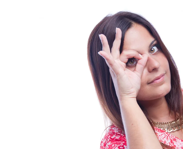 Jong meisje observeren gebaar — Stockfoto