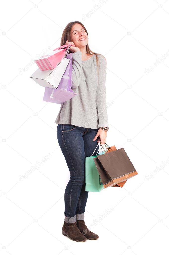 Happy girl holding a shopping bags