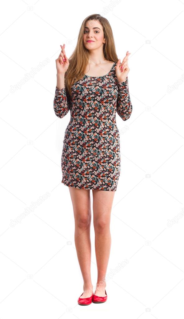 Young girl finger crossed gesture