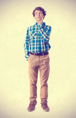 young boy thinking