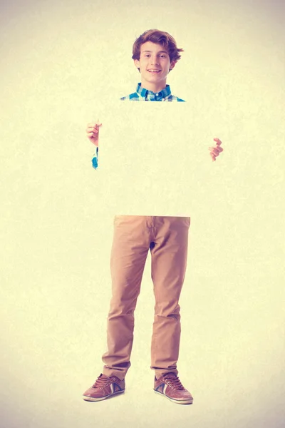 Teenager holding a placard — Stock Photo, Image