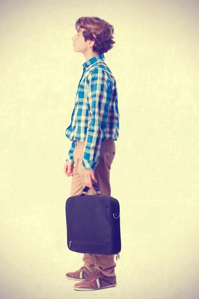 Подросток с чемоданом — стоковое фото