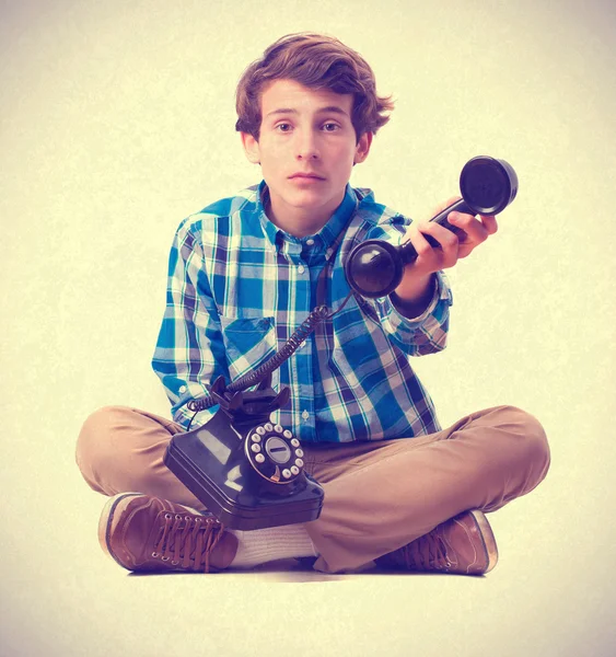 Teenager showing a phone — Stock Photo, Image