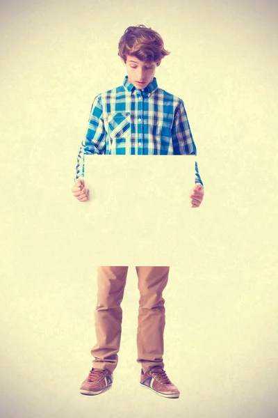 Teenager showing a placard — Stock Photo, Image
