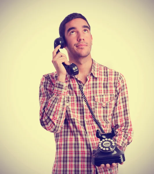 Osäkra pojken prata via telefon — Stockfoto