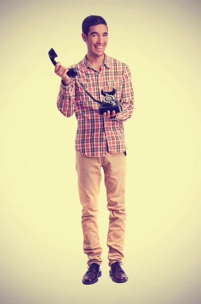 Boy holding a telephone — Stock Photo, Image