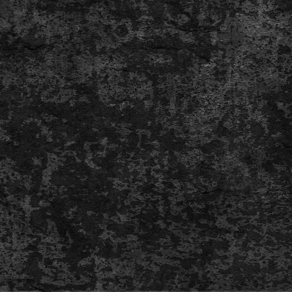 Чёрная каменная стена — стоковое фото