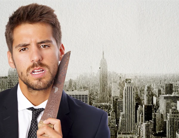 Hombre de negocios en rascacielos fondo — Foto de Stock