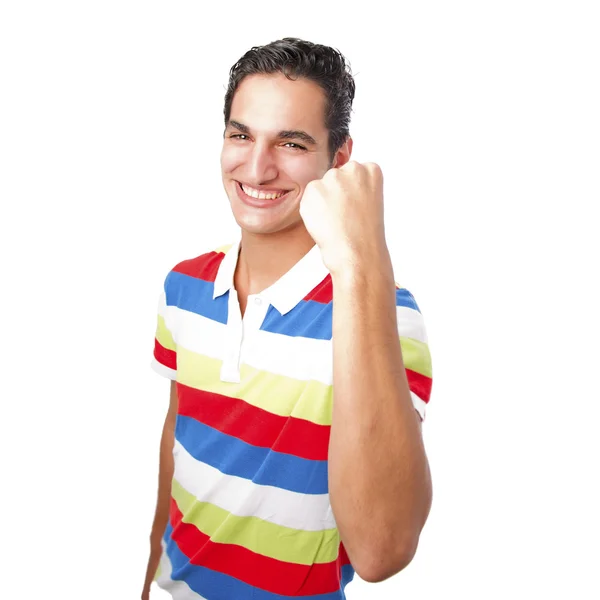 Молодой красивый мужчина с успехом жестом — стоковое фото