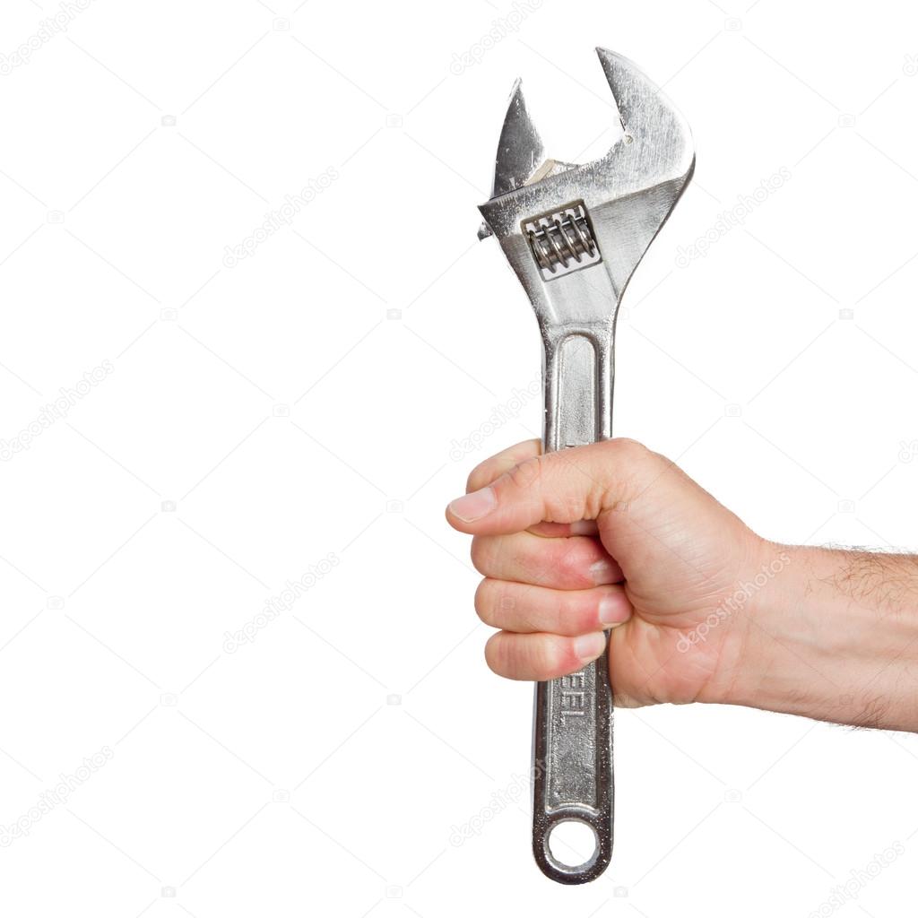 Young man with a wrench