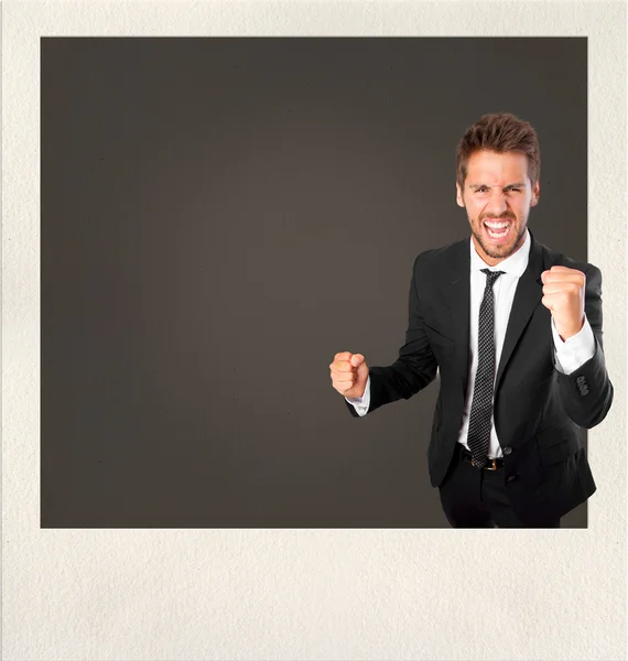 Young man celebrating gesture on photo frame — Stock Photo, Image