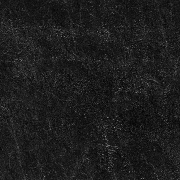 Текстура черного камня или стены — стоковое фото