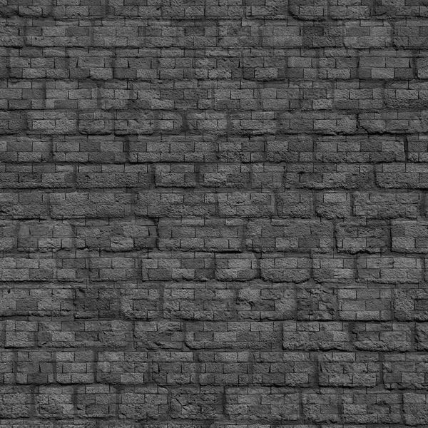 Zwarte stenen muur — Stockfoto