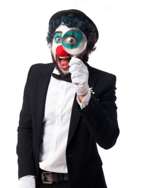 bir büyüteç cam palyaço