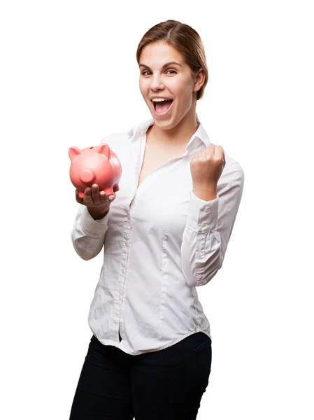 Blond woman with a piggy bank — Stock Photo, Image