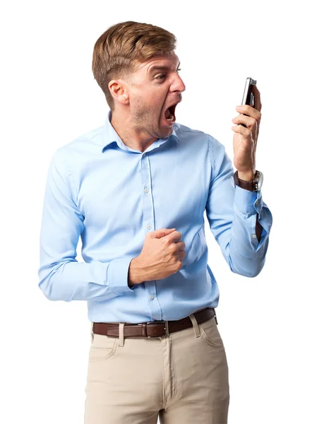 Blond man shouting on phone — Stock Photo, Image