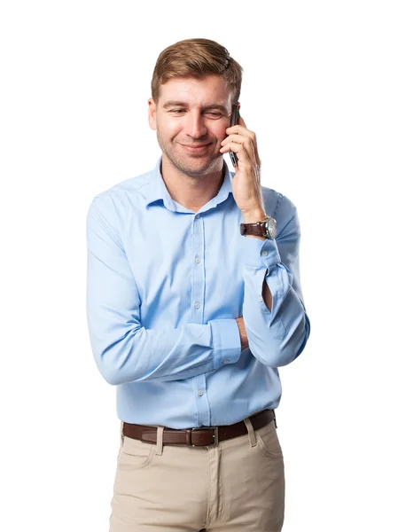 Blond man speaking on phone — Stock Photo, Image