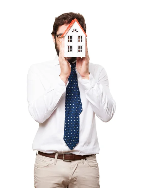 Businessman with a house — Stock Photo, Image