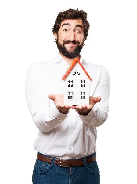 Man holding a house — Stock Photo, Image