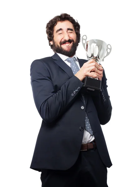 Businessman with a winner cup — Stock Photo, Image