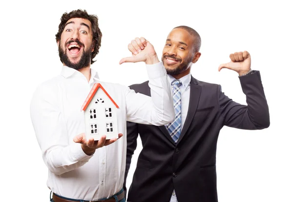 Man holding a house — Stock Photo, Image