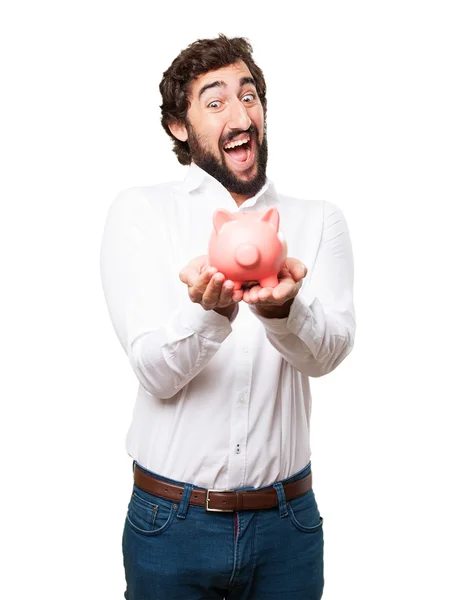 Homem com um banco porquinho — Fotografia de Stock