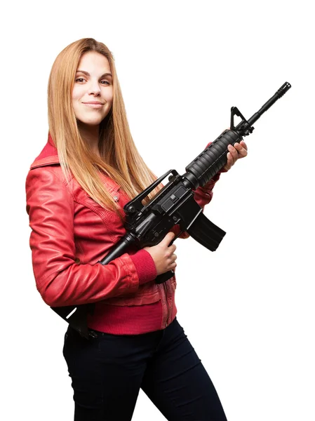 Mujer rubia con un arma — Foto de Stock