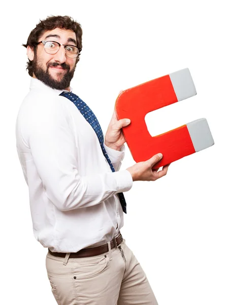 Geschäftsmann mit Magnet — Stockfoto