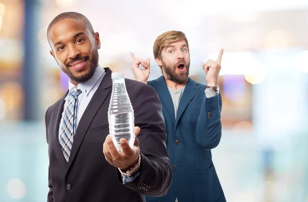 Joven fresco hombre negro con botella de agua —  Fotos de Stock