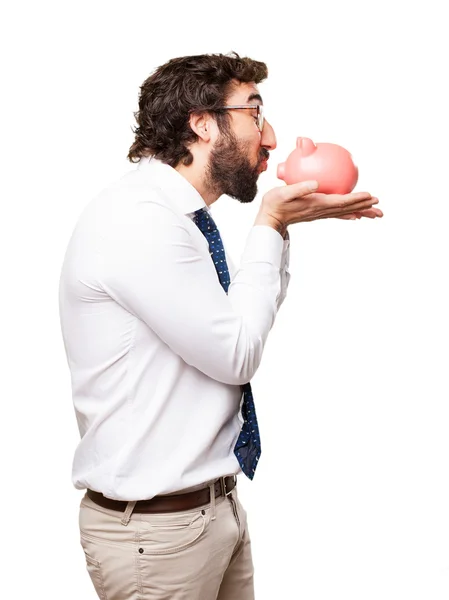 Geschäftsmann mit Sparschwein — Stockfoto