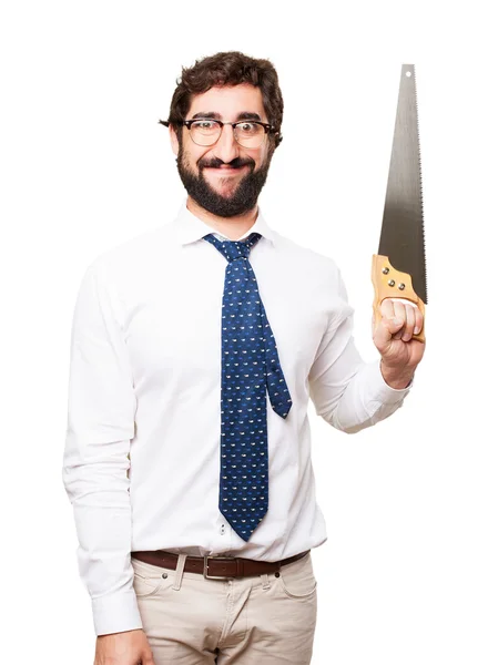 Businessman with a saw — Stock Photo, Image