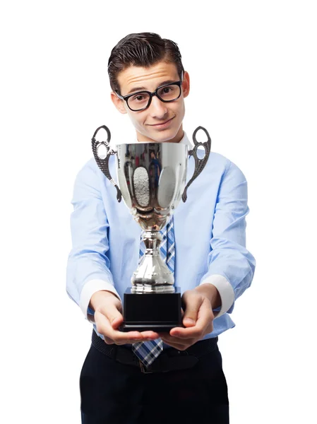 Üzletember egy győztes csésze — Stock Fotó