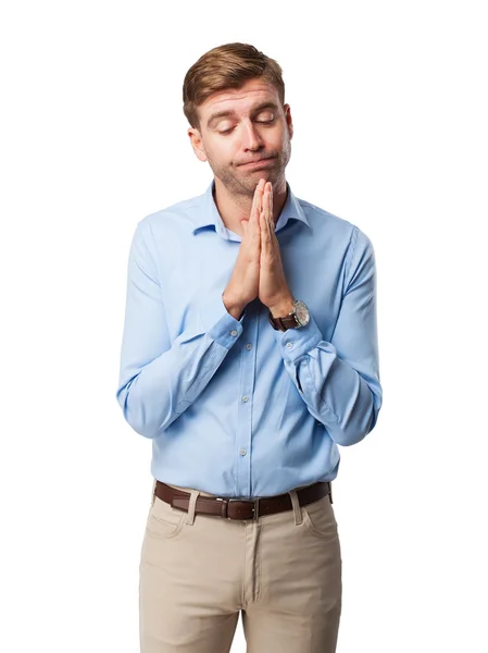 Blond man praying — Stock Photo, Image